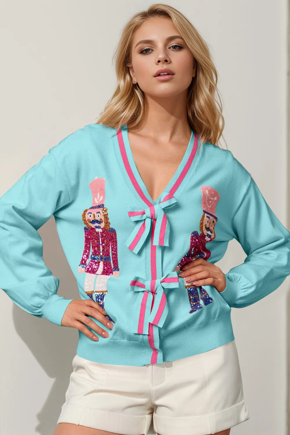 Modern Finesse Nutcracker Sequin Bow Cardigan by Double Take