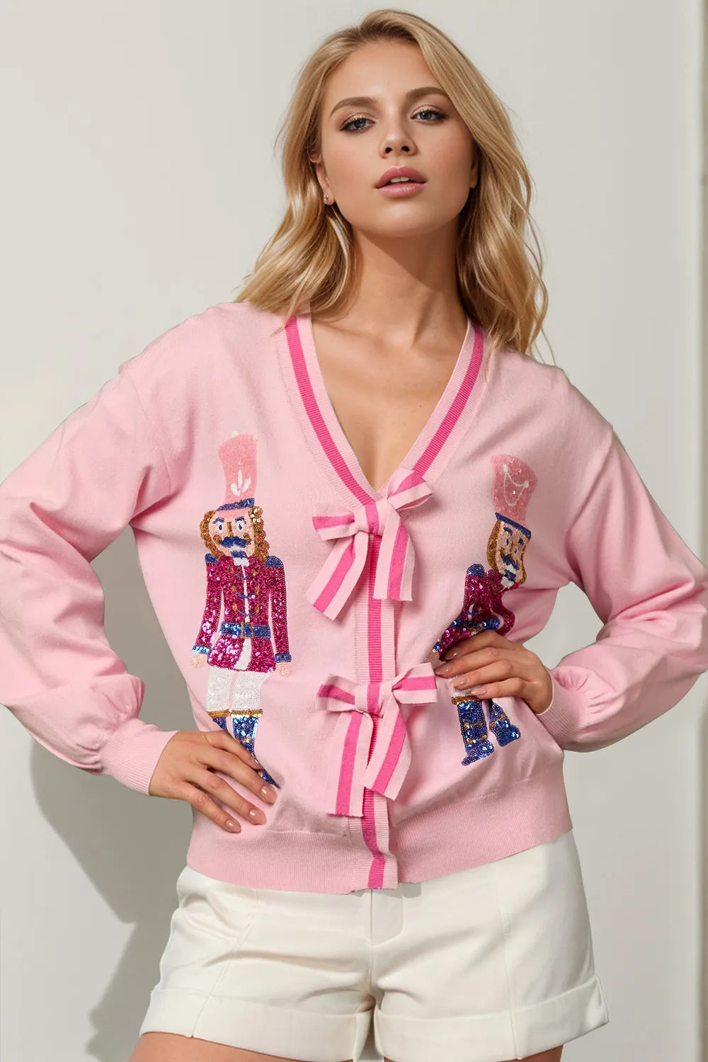 Modern Finesse Nutcracker Sequin Bow Cardigan by Double Take