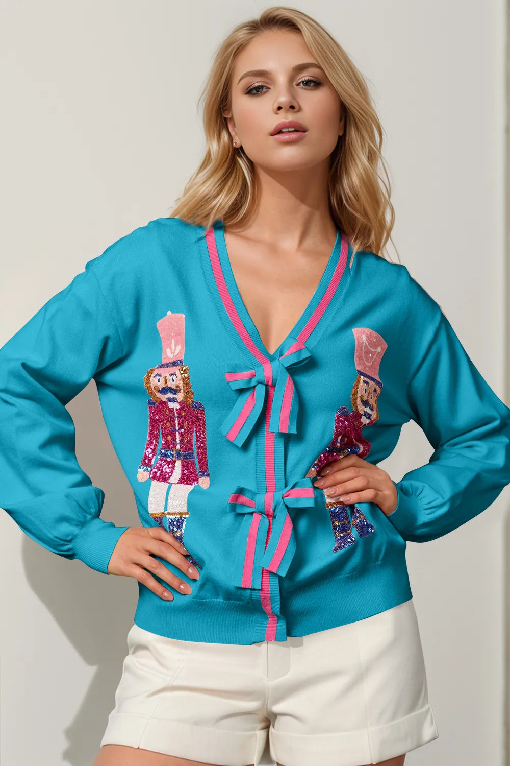 Modern Finesse Nutcracker Sequin Bow Cardigan by Double Take