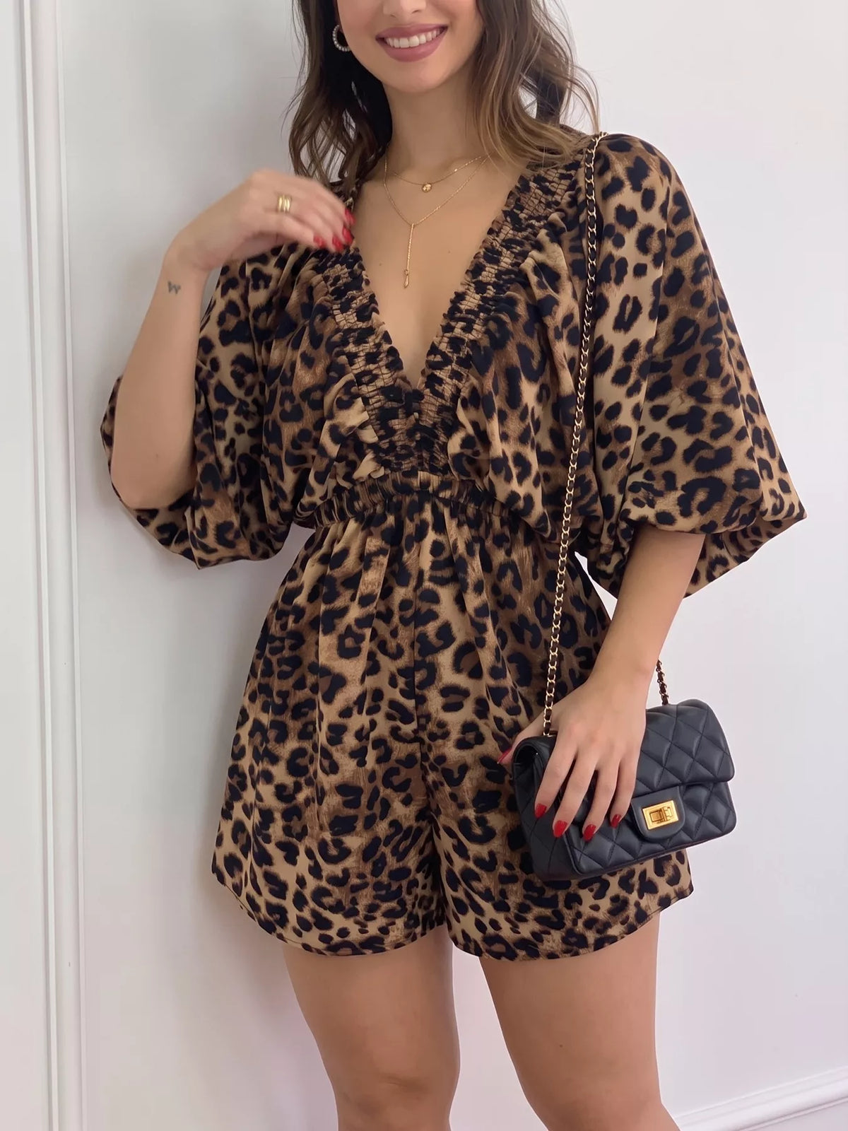 Modern Finesse Sienna V-Neck Leopard Print Puff Sleeve Romper