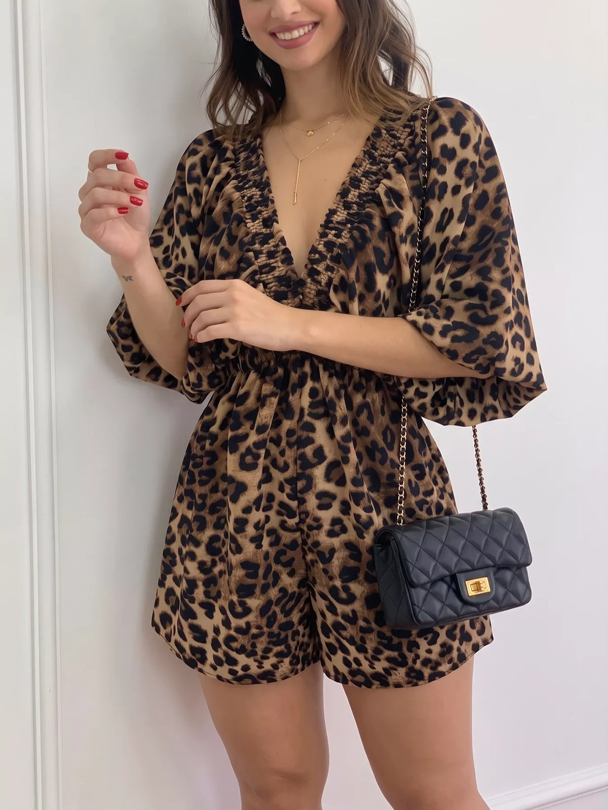 Modern Finesse Sienna V-Neck Leopard Print Puff Sleeve Romper