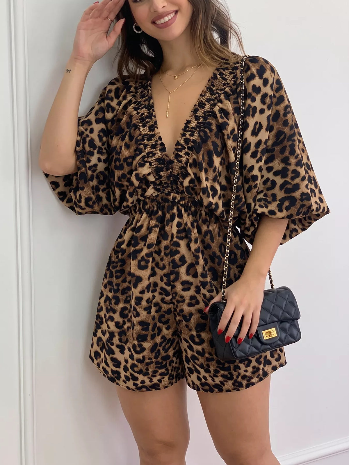 Modern Finesse Sienna V-Neck Leopard Print Puff Sleeve Romper